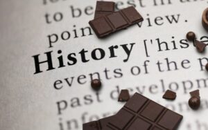 שוקולד מונח על גבי דף מספר היסטוריה
