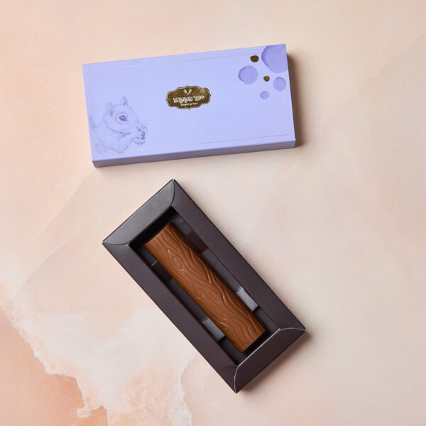 שוקולד דובאי - ענף שוקולד חלב במילוי פרלינה פיסטוק ושערות קדאיף קריספיות